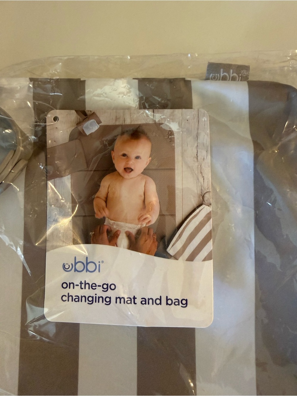 Ubbi Gray & White Stripe On-the-Go Changing Mat and Storage Bag